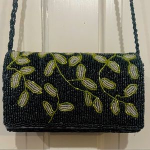 Beaded evening bag with long shoulder strap